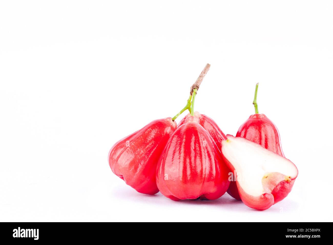 half rose apple and water apples ( chomphu ) on white background