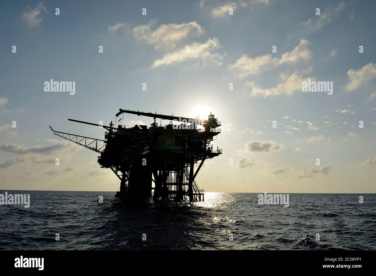 View of oil and gas rigs in the Gulf of Thailand. Numerous wellheads
