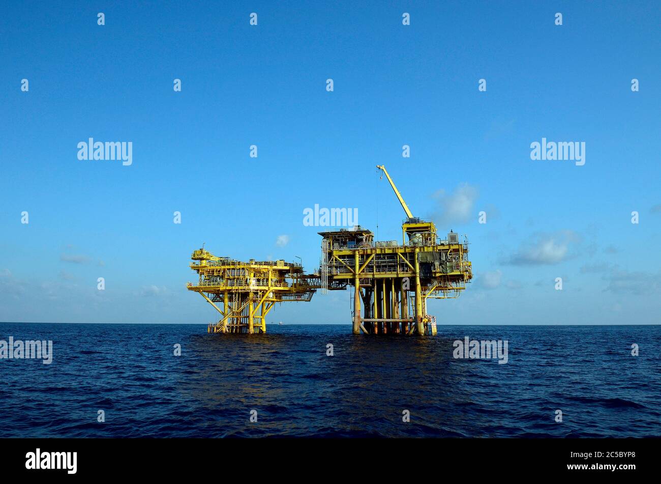 View of oil and gas rigs in the Gulf of Thailand. Numerous wellheads