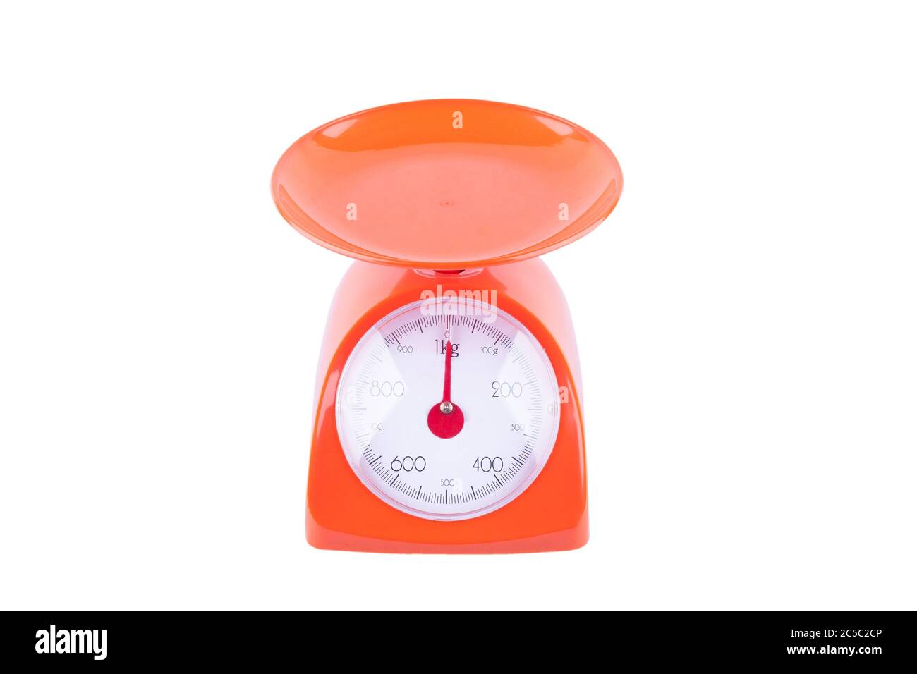 orange weight scales on white background kitchen equipment object isolated Stock Photo