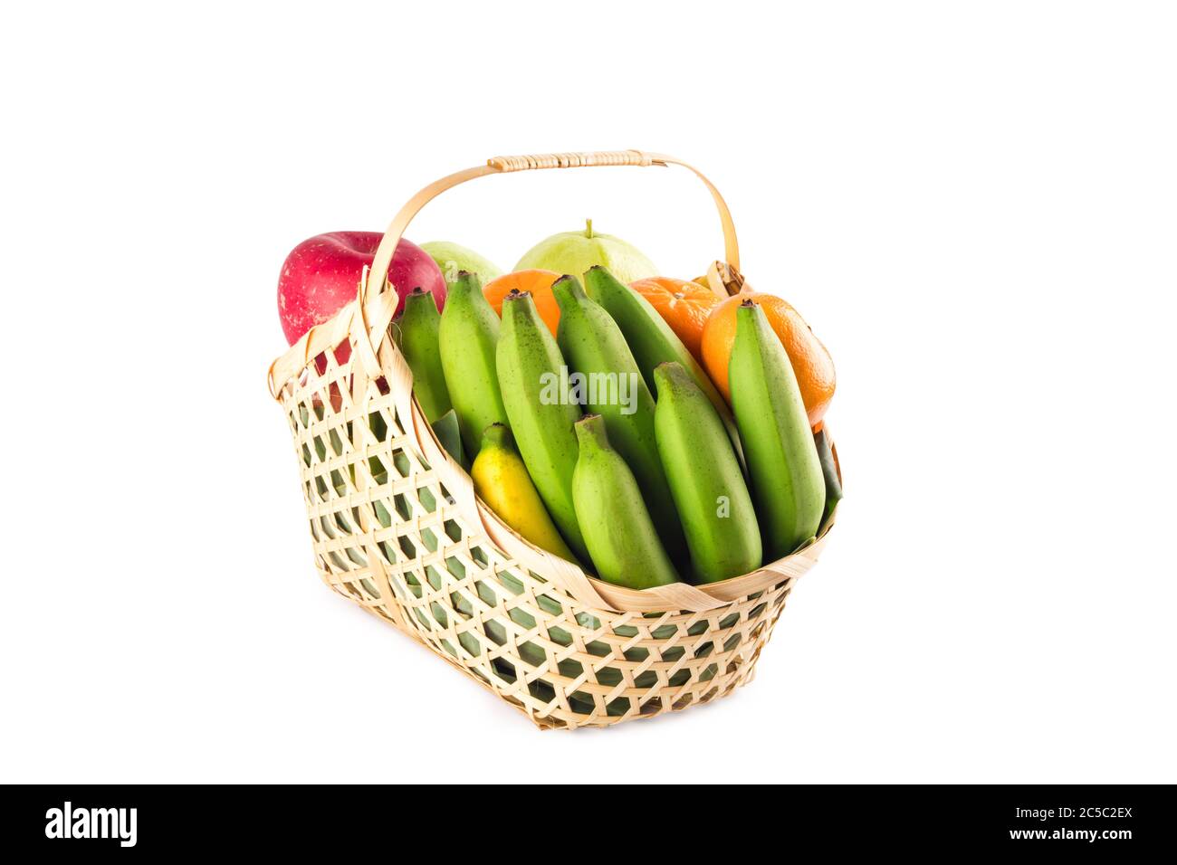 fruits basket assorted wicker on white background fruit health food isolated Stock Photo