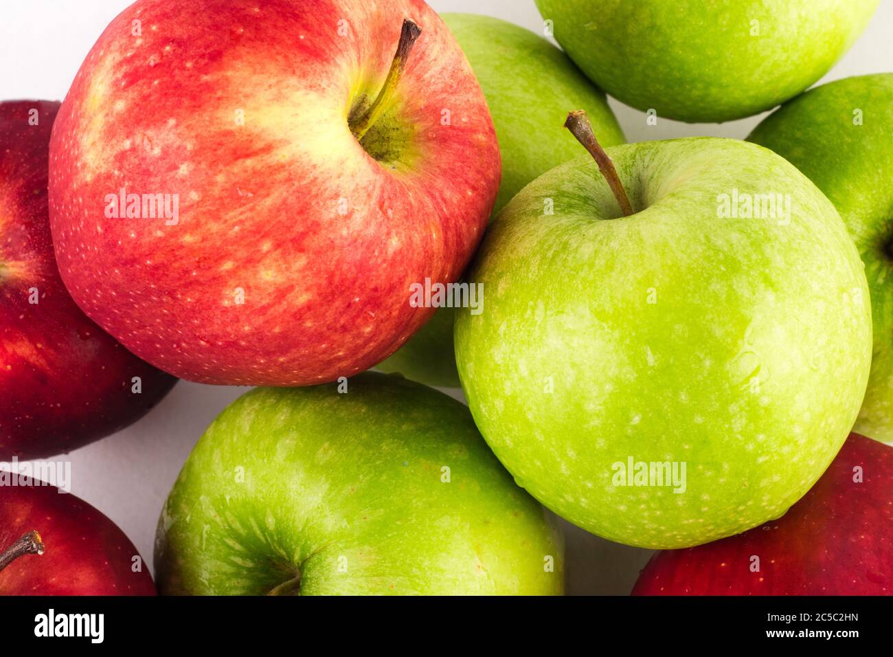 green apple and red apple close up on white background fruit agriculture food isolated Stock Photo