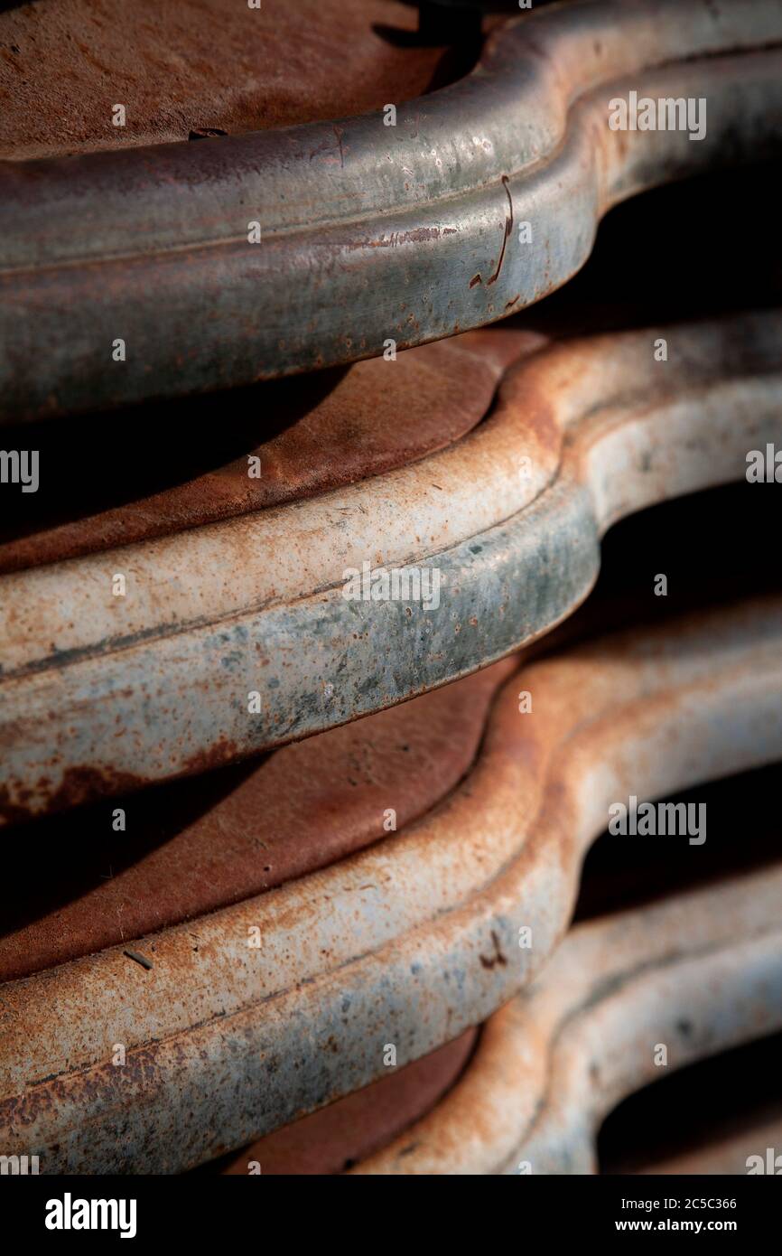 Abstract view of an old rusting chrome front end of an old car Stock Photo