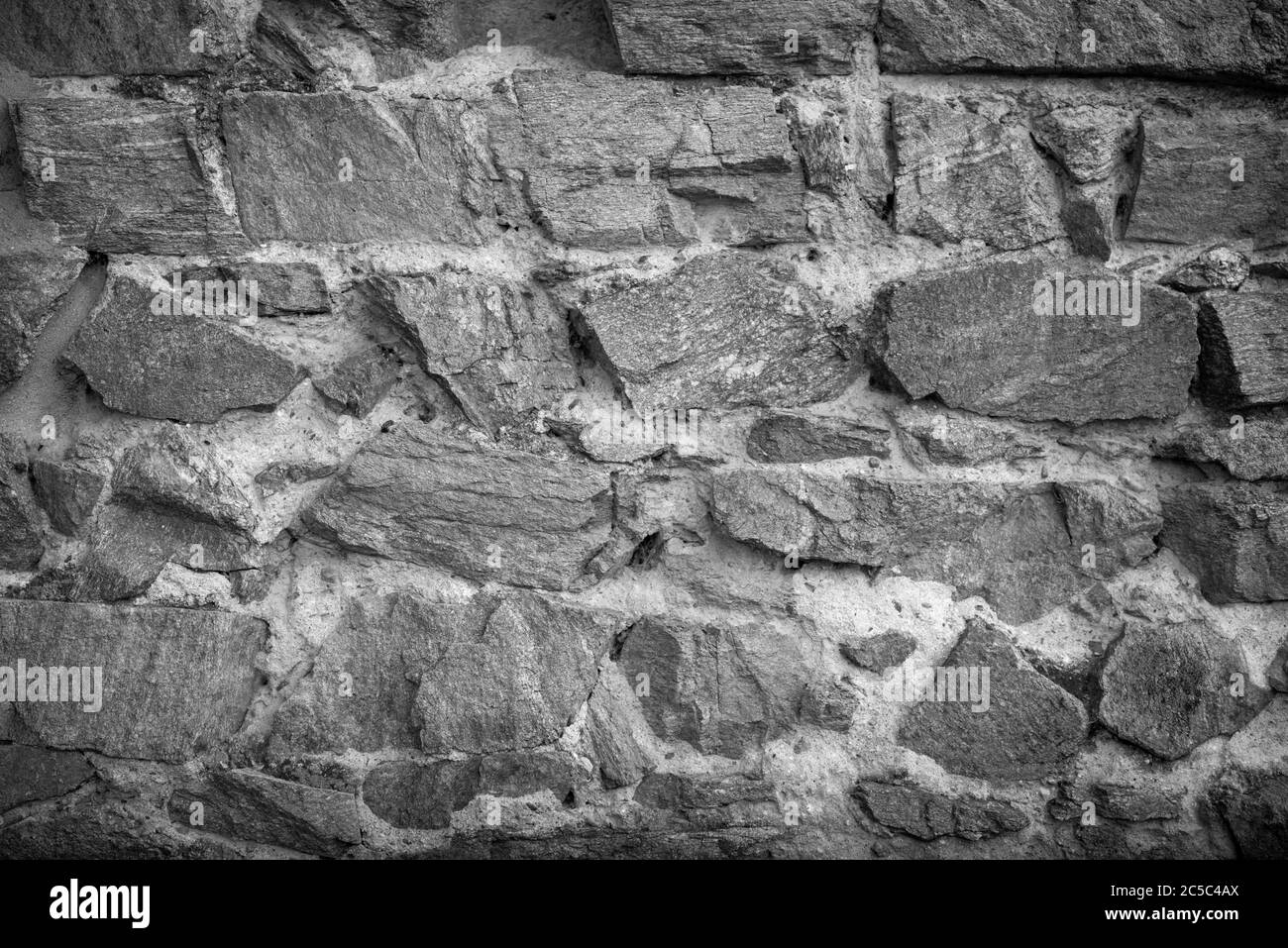 visiting the traditional house that has a stone wall Stock Photo - Alamy