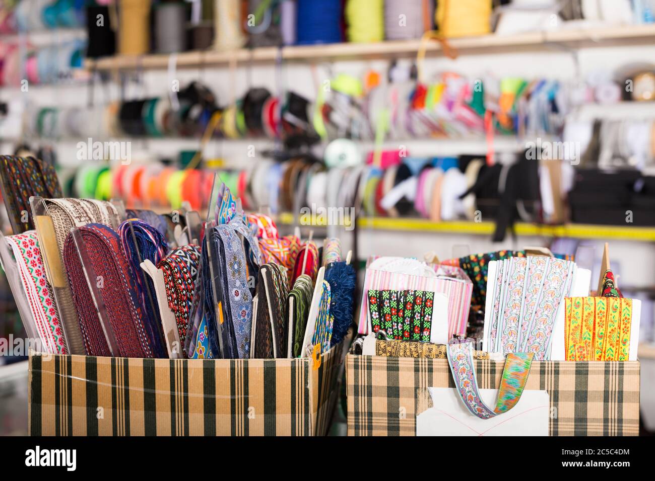 Large assortment of colored textile ribbons for sale on needlework ...