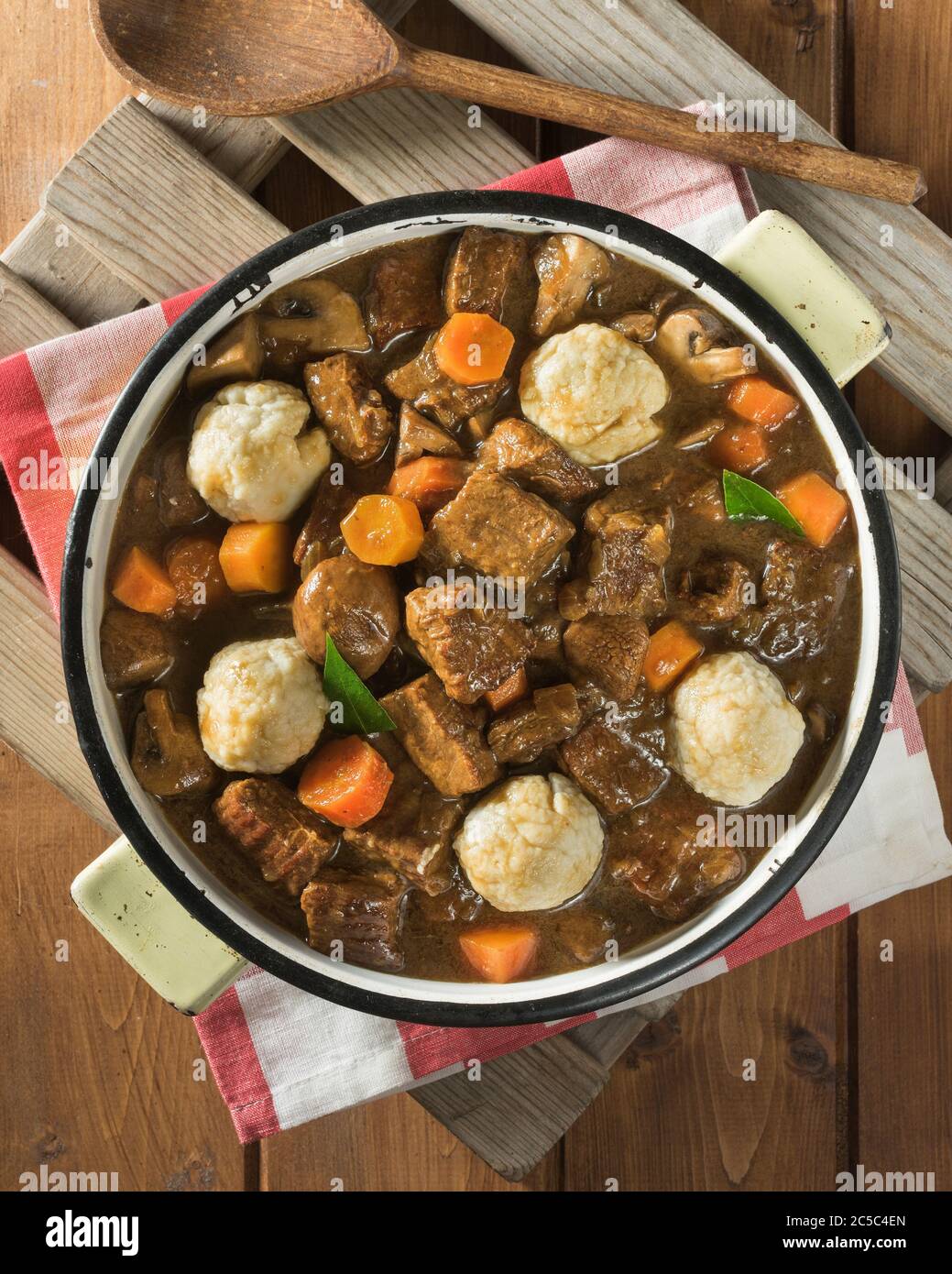 Beef and ale stew with dumplings. UK Food Stock Photo