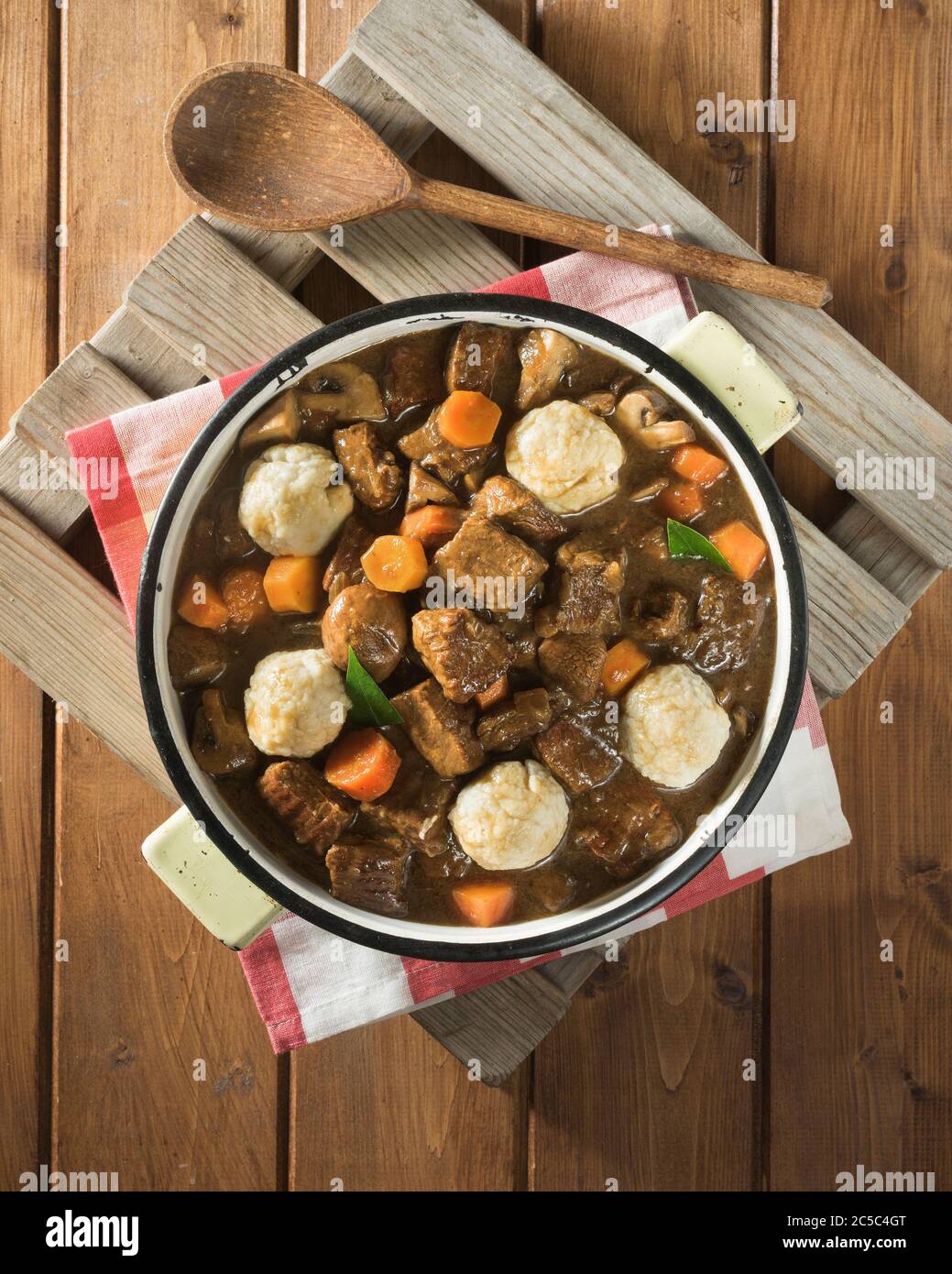 Beef and ale stew with dumplings. UK Food Stock Photo