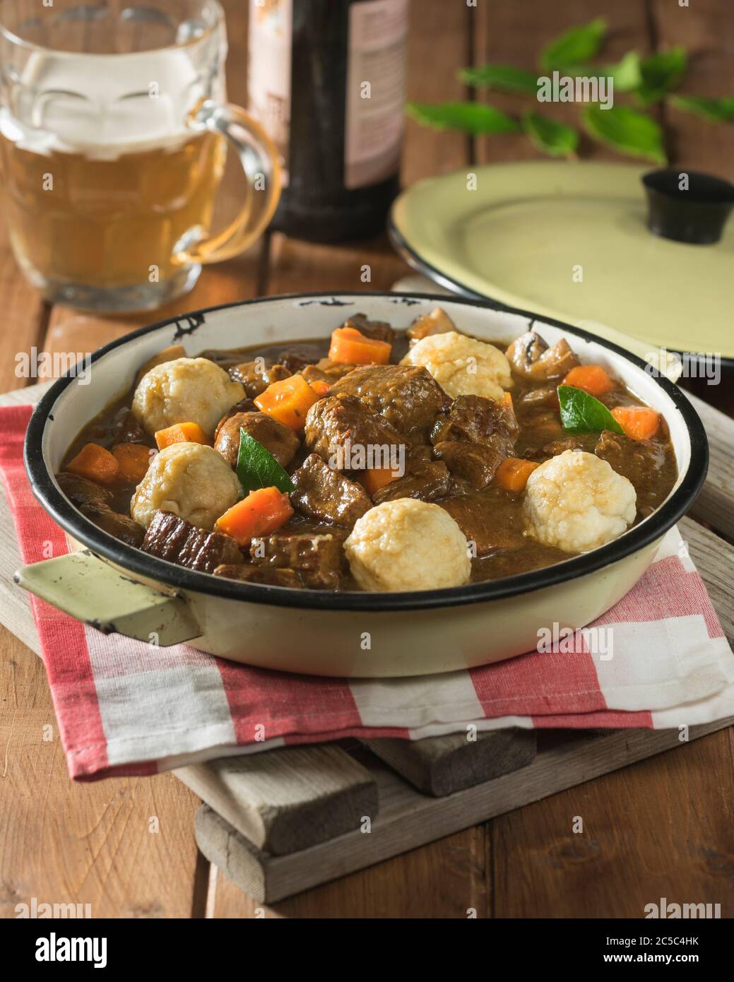 Beef and ale stew with dumplings. UK Food Stock Photo