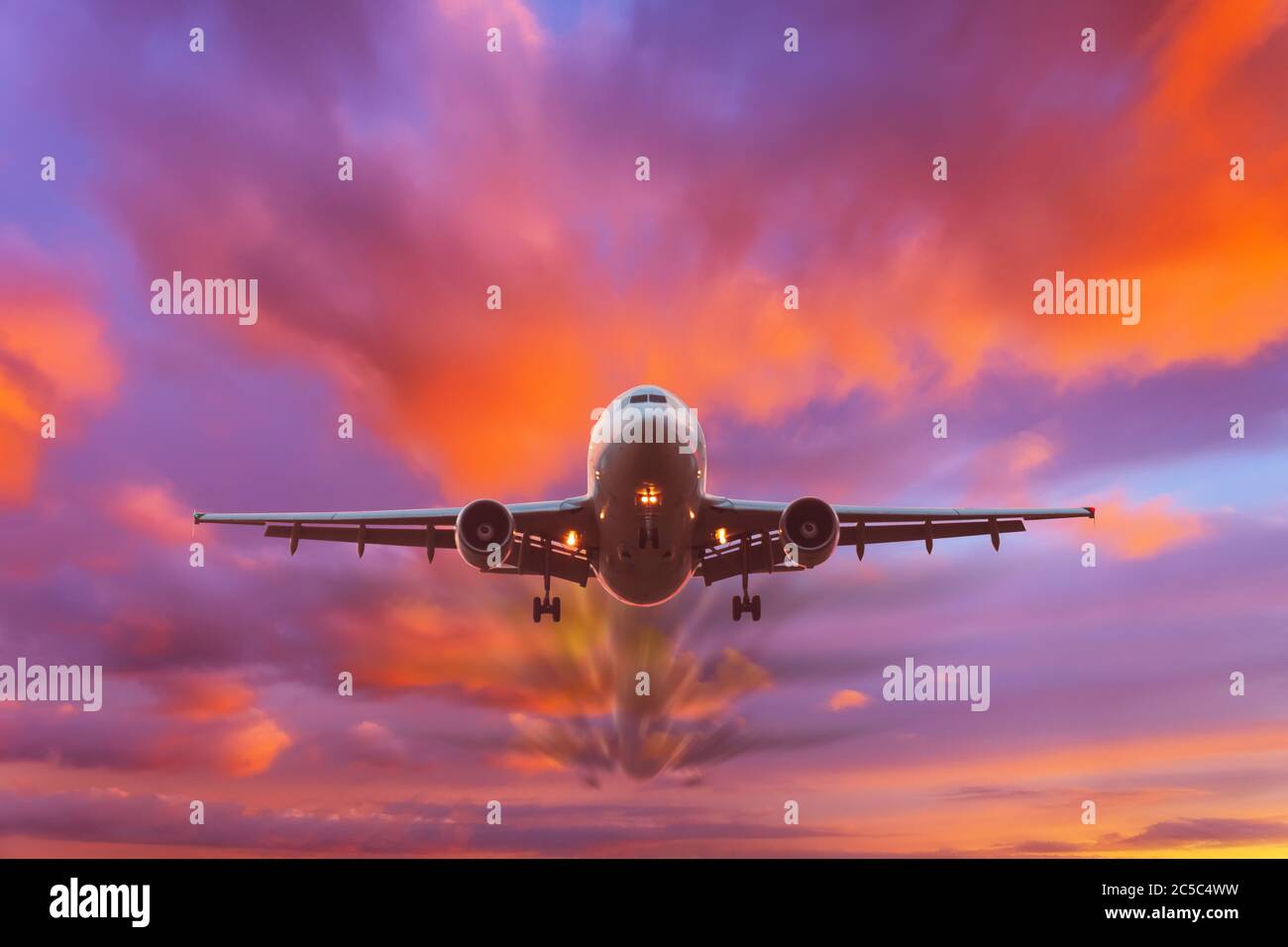 Flying passenger plane hi-res stock photography and images - Alamy