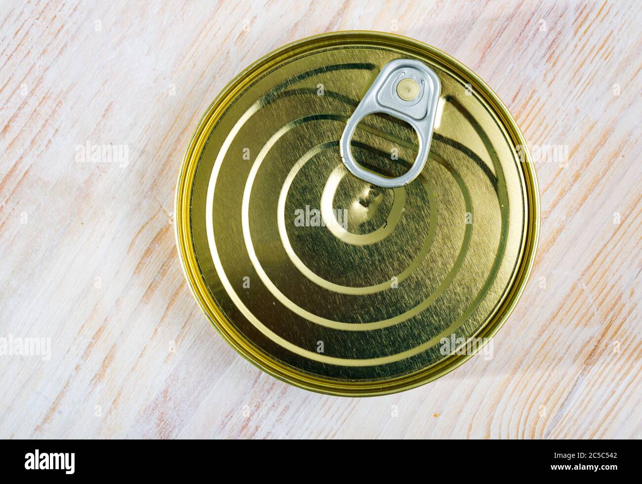 Download Closeup Of Unlabelled Tin Can With Easy Open Lid With Ring Pull Tab On Wooden Background Stock Photo Alamy PSD Mockup Templates