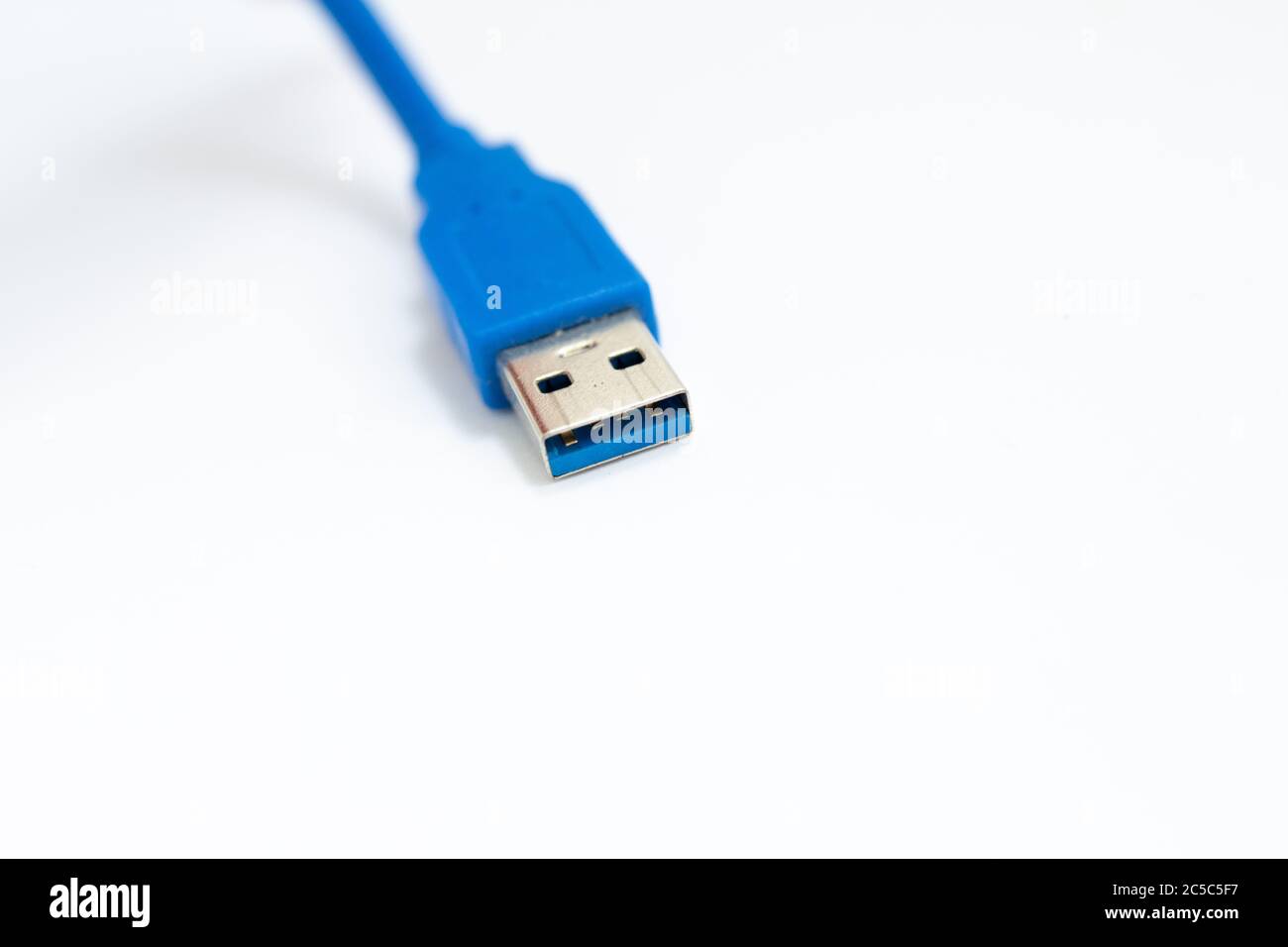 blue usb cable on white background Stock Photo Alamy