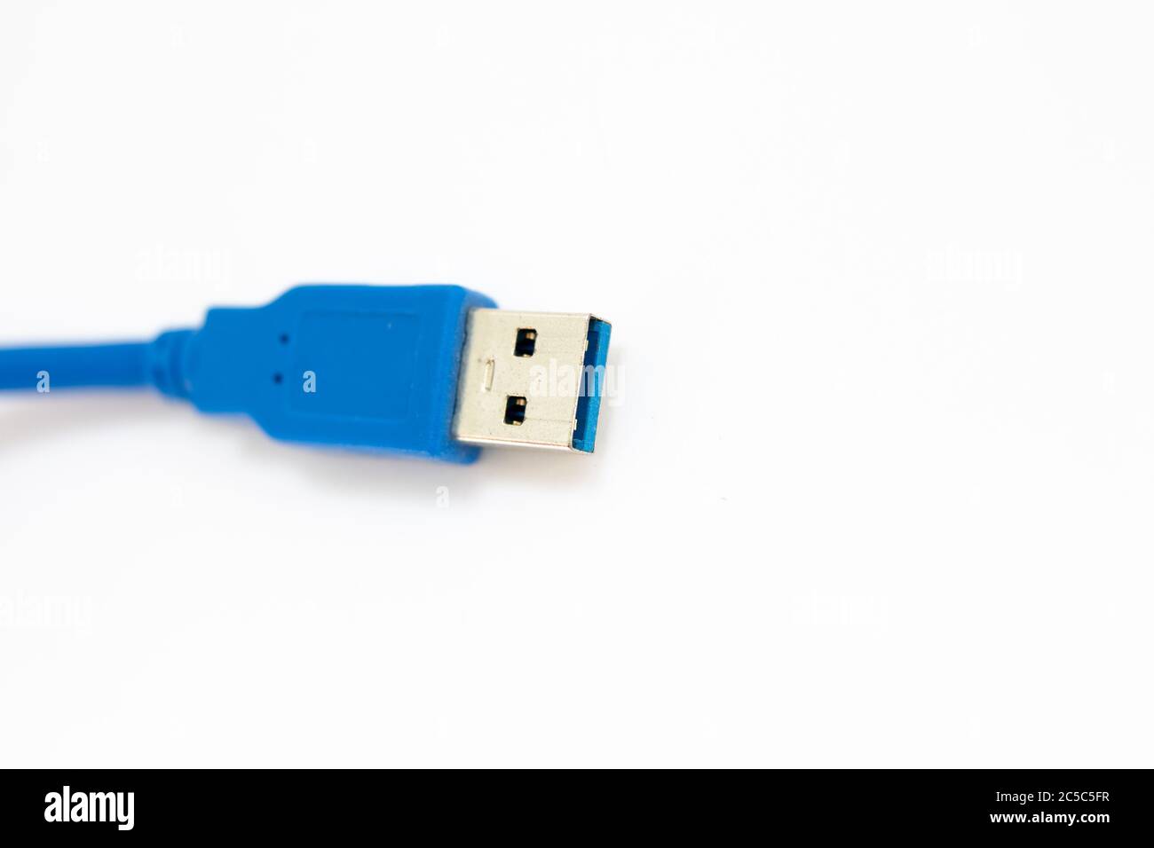 blue usb cable on white background Stock Photo Alamy