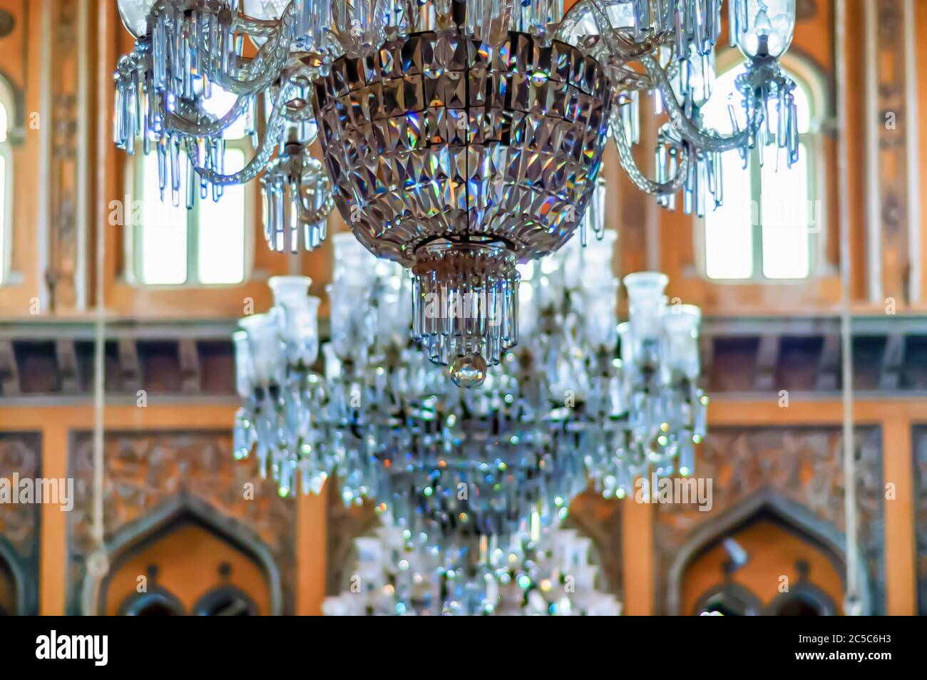 Chandeliers hanging from the ceiling of Khilwat Mubarak/Durbar Hall