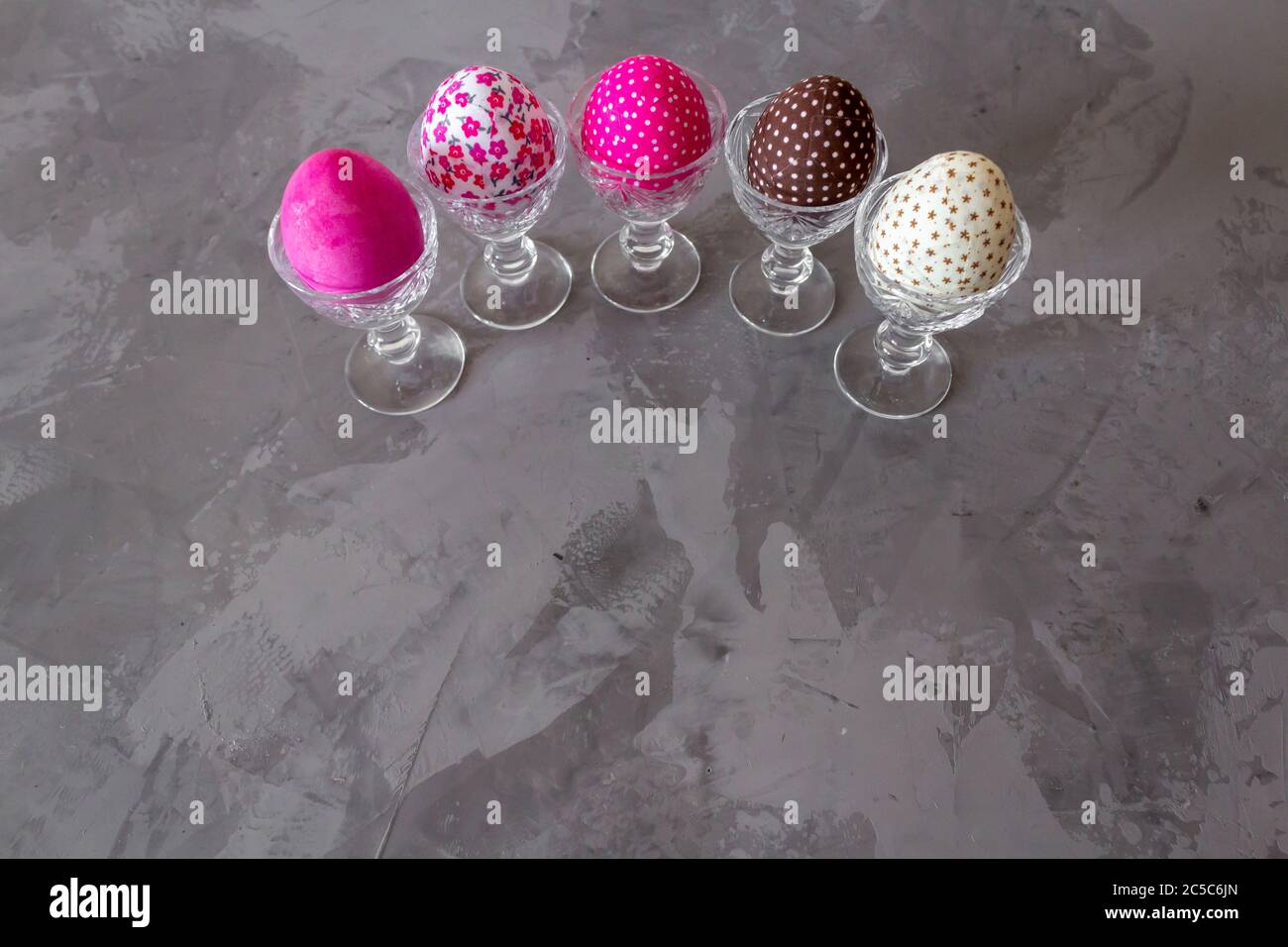 Happy Easter Day With Colorful Eggs On a Grey Background Stock Photo