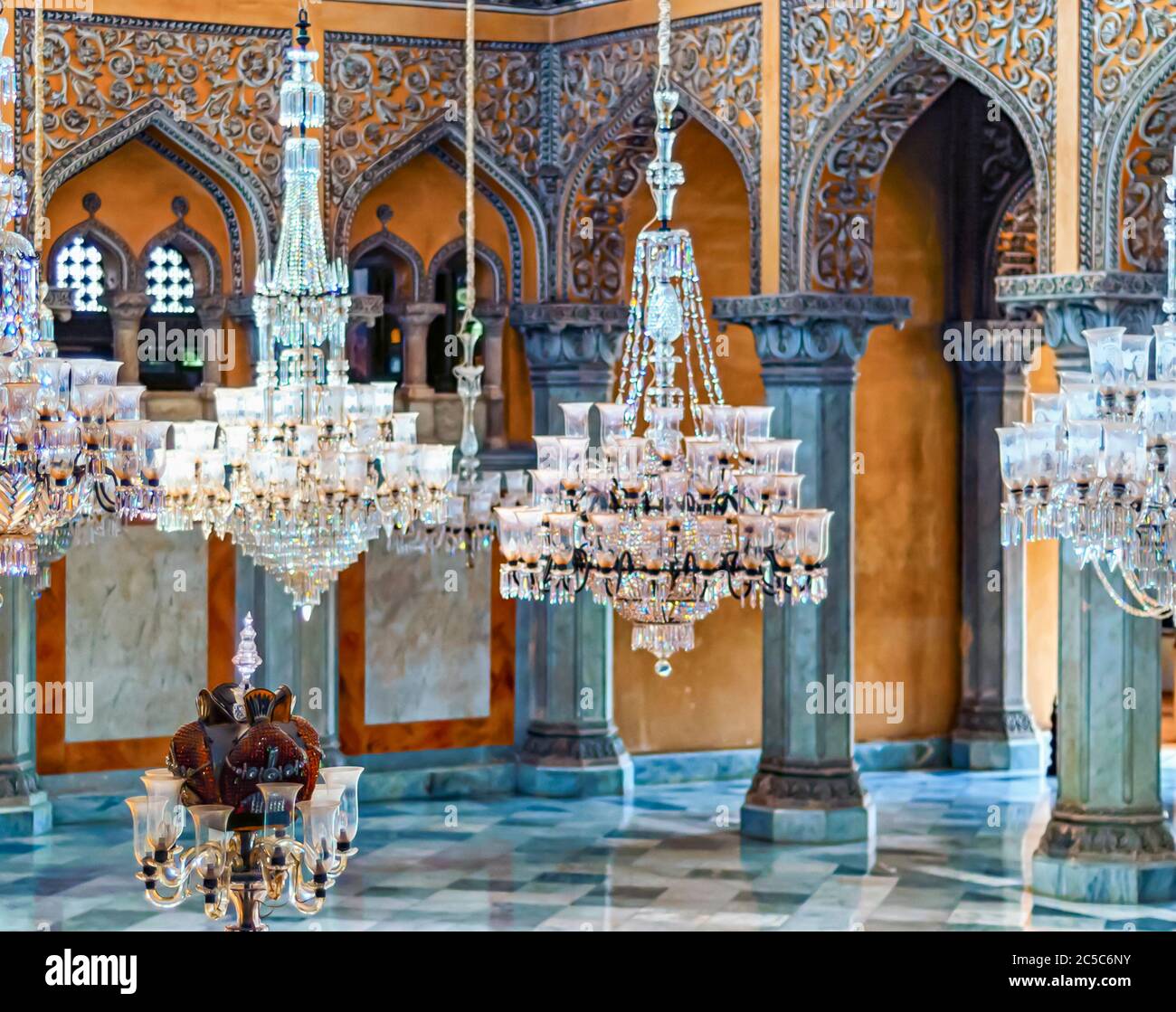 Chandeliers hanging from the ceiling of Khilwat Mubarak/Durbar Hall