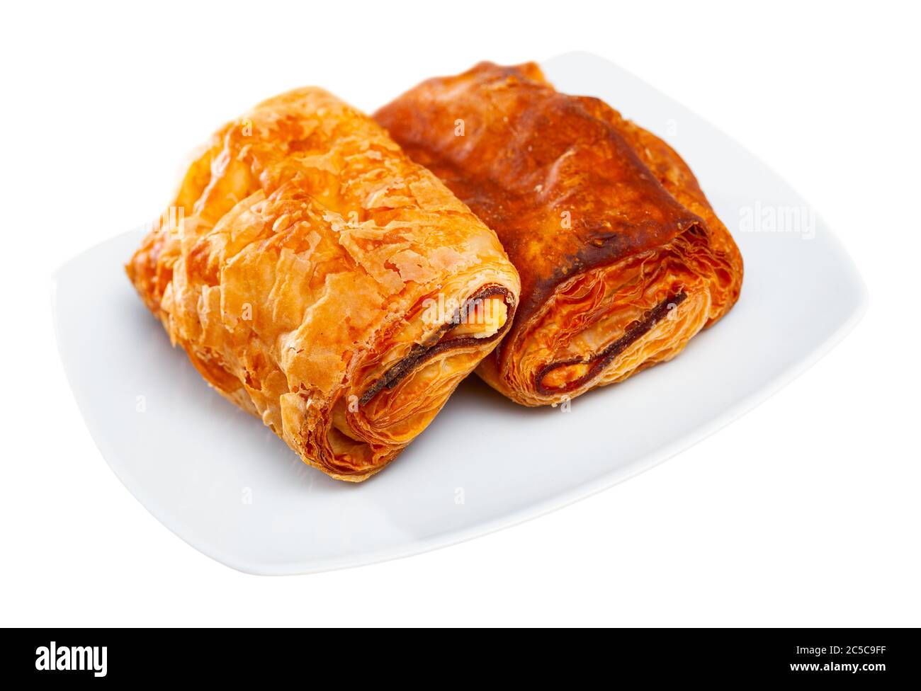 Crispy puff pastry napolitana with meat and cheese filling. Isolated over white background Stock Photo