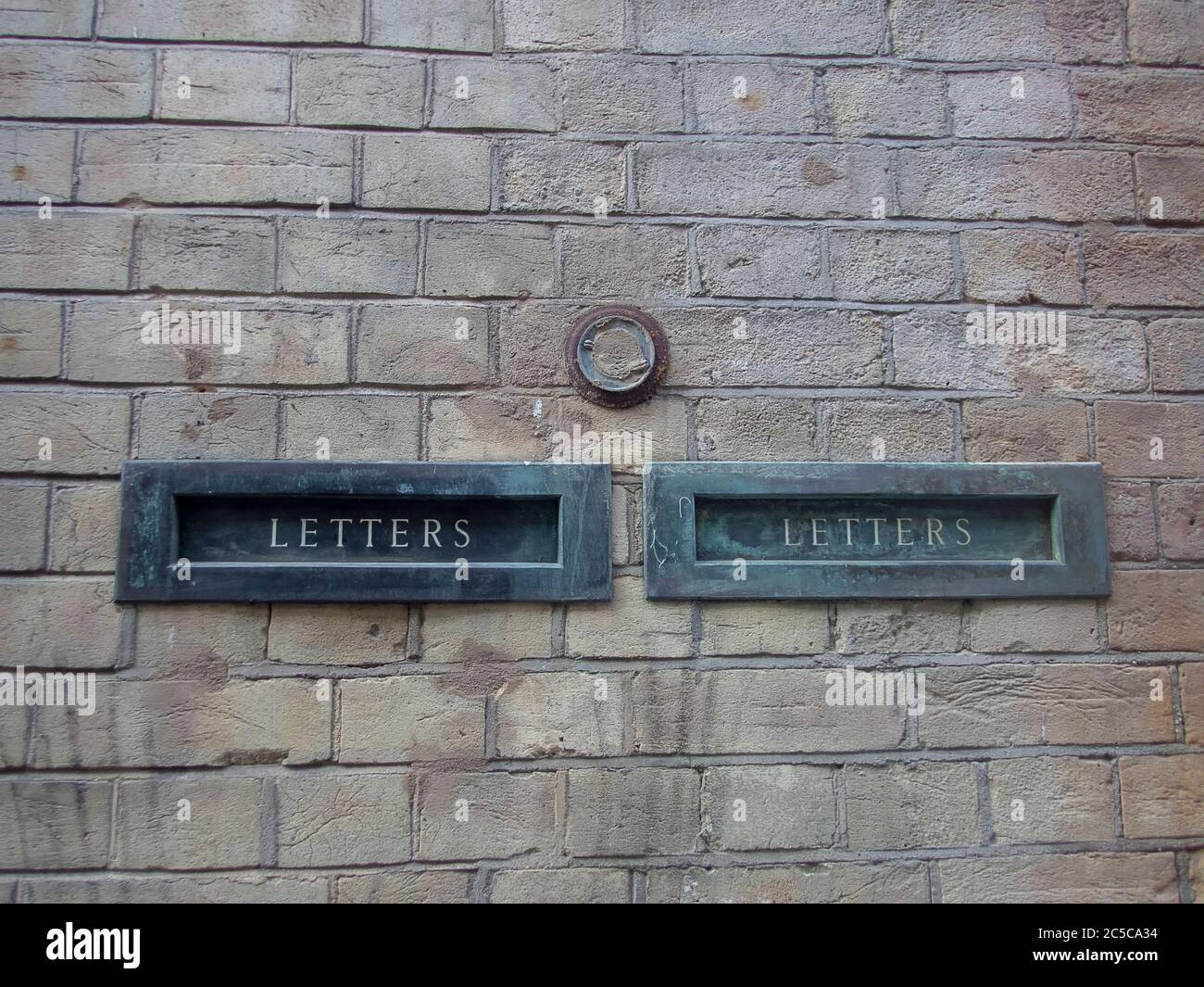 Letter boxes in a brick wall Stock Photo Alamy
