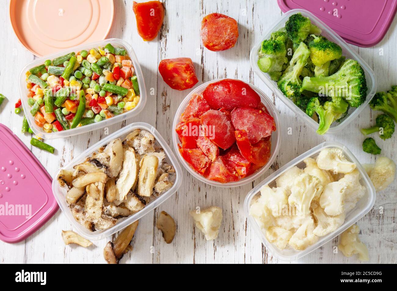 Frozen vegetables. Stocks of food for the winter. Container with frozen