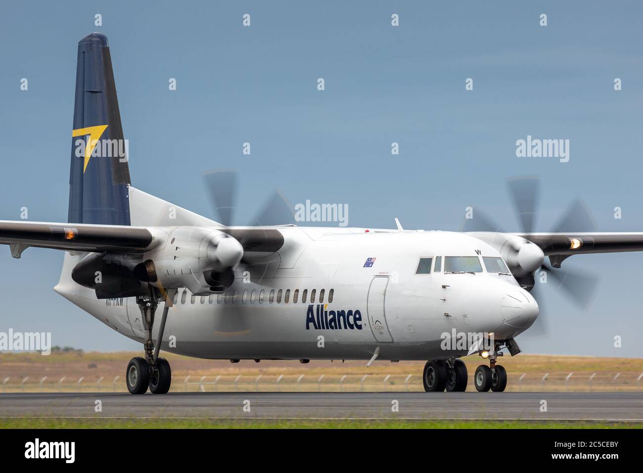 Alliance airlines Fokker 50 regional airliner aircraft taxiing at Avalon Airport. Stock Photo