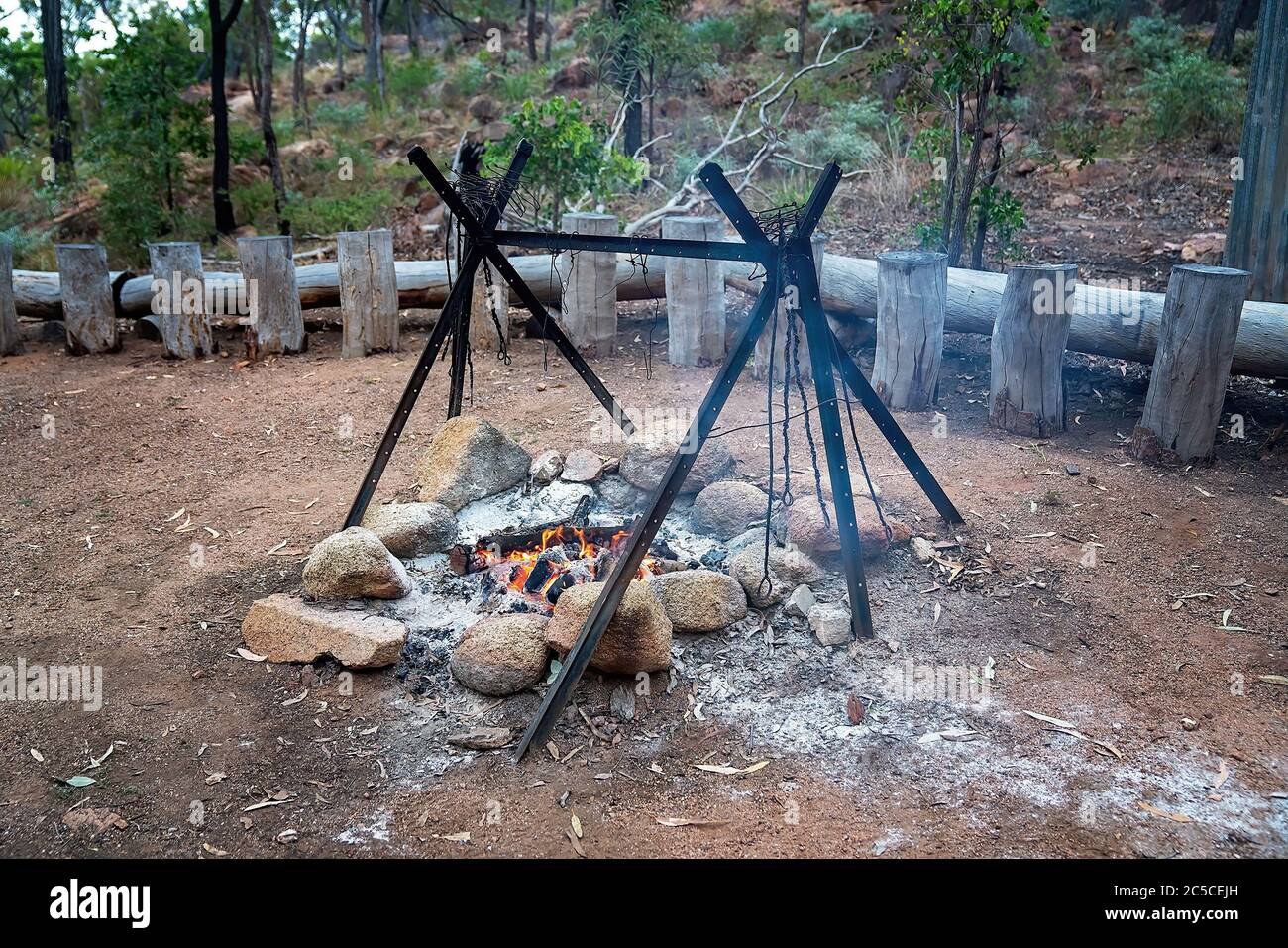 Campfire for a guest bush breakfast at an outback Australian tourist resort in a volcanic national park Stock Photo