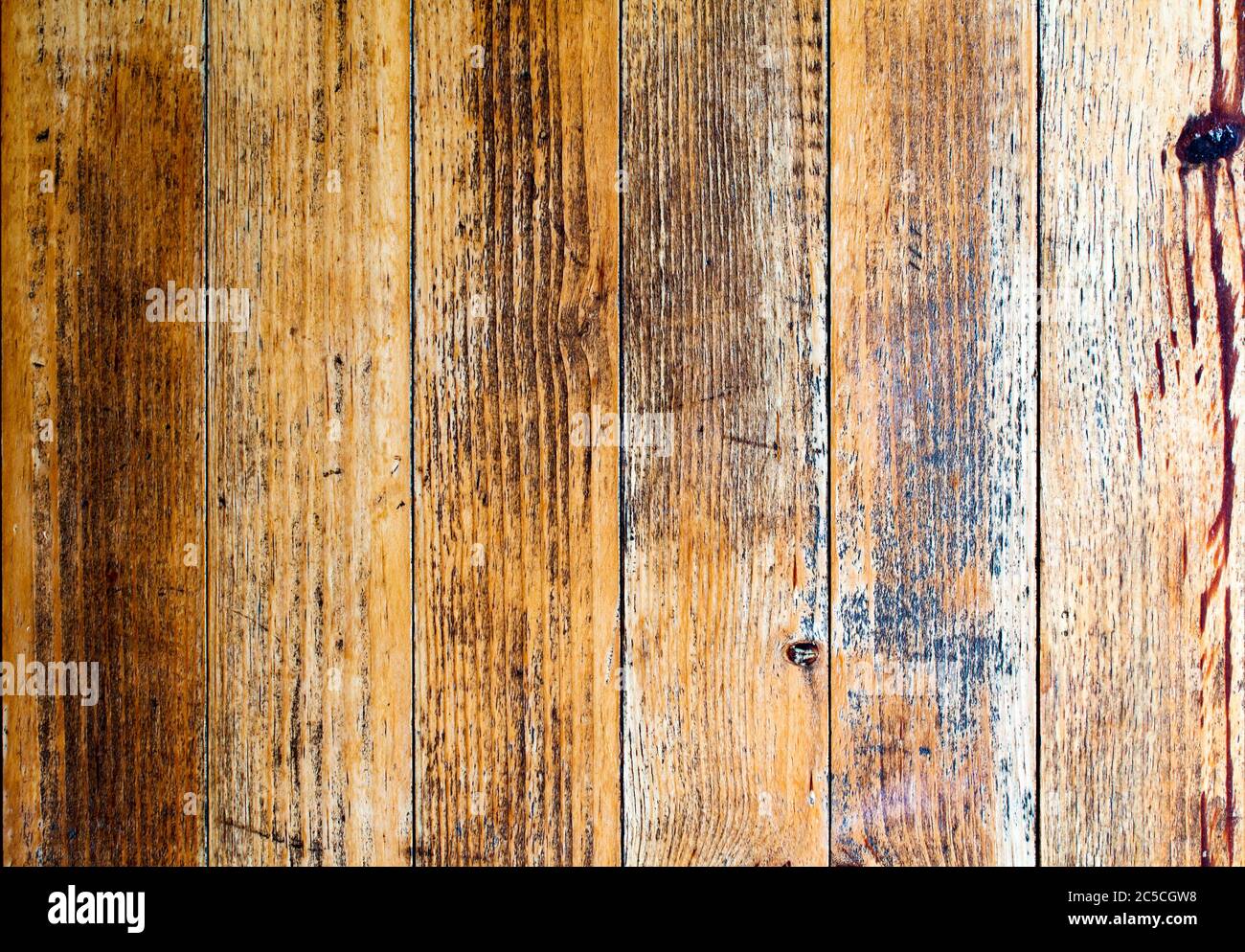 Distress wood texture with the varnish wearing away Stock Photo