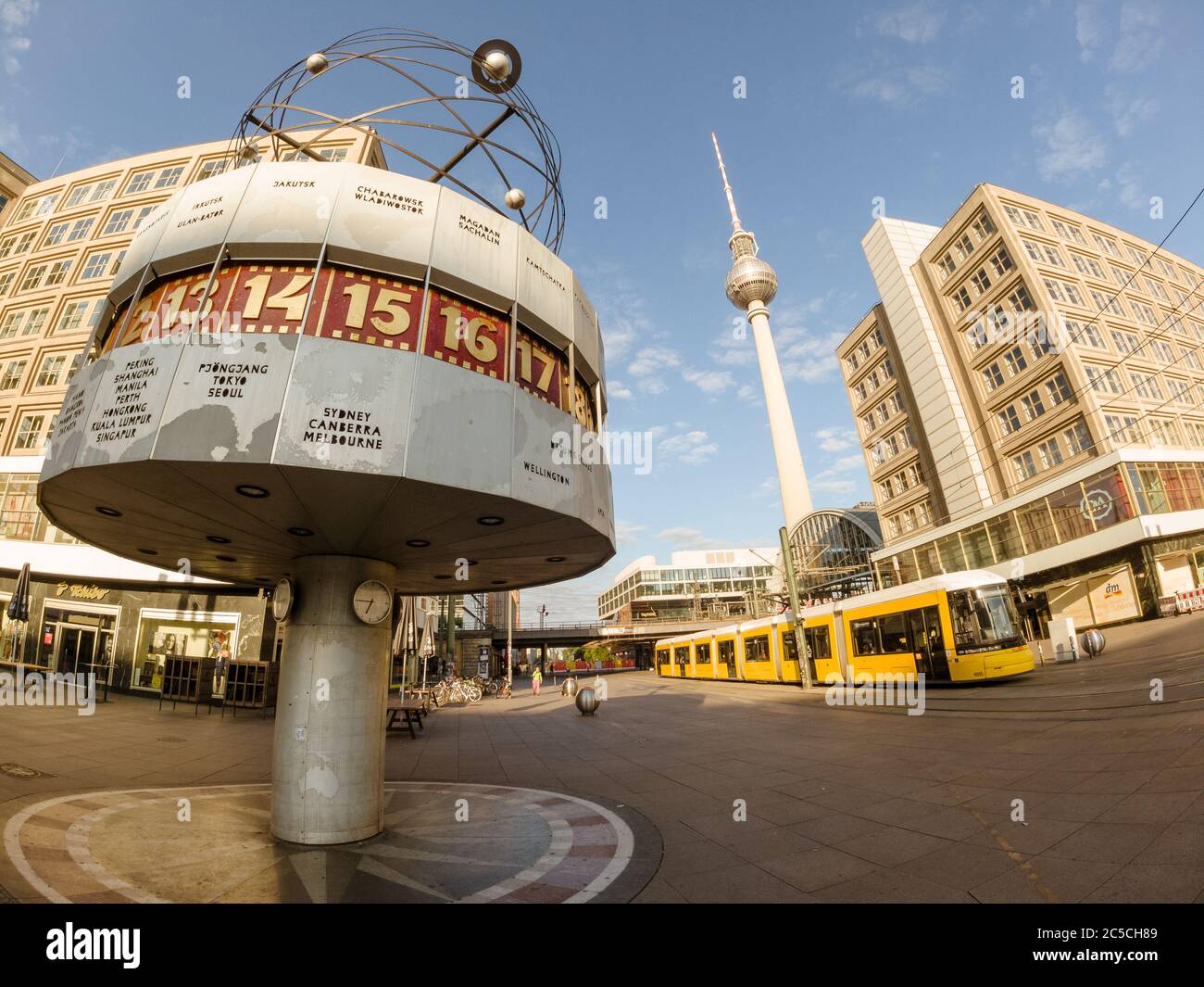 Berlin, Germany - June 15, 2020 - View of the famous world clock on Alexanderplatz in Berlin with the Berlin TV tower in the background Stock Photo