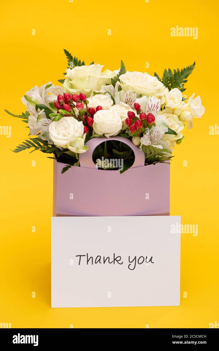 Spring Fresh Bouquet Flowers Violet Paper Bag Isolated Yellow Stock Photo  by ©VadimVasenin 351281654