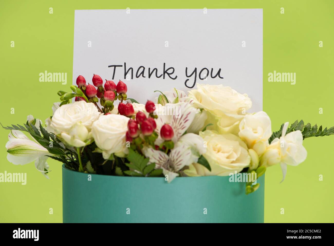 fresh bouquet of flowers in gift box with thank you greeting card ...