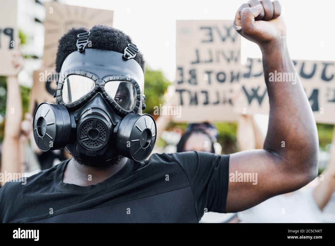 Anti Racism Mask Activist wearing gas mask protesting against racism and fighting for ...