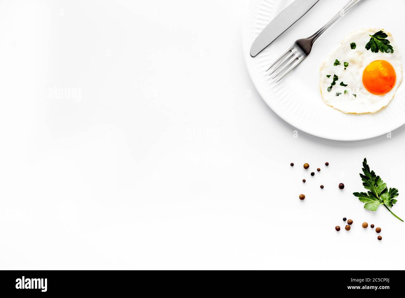 Fried eggs on plate - white desk top view space for text Stock Photo ...
