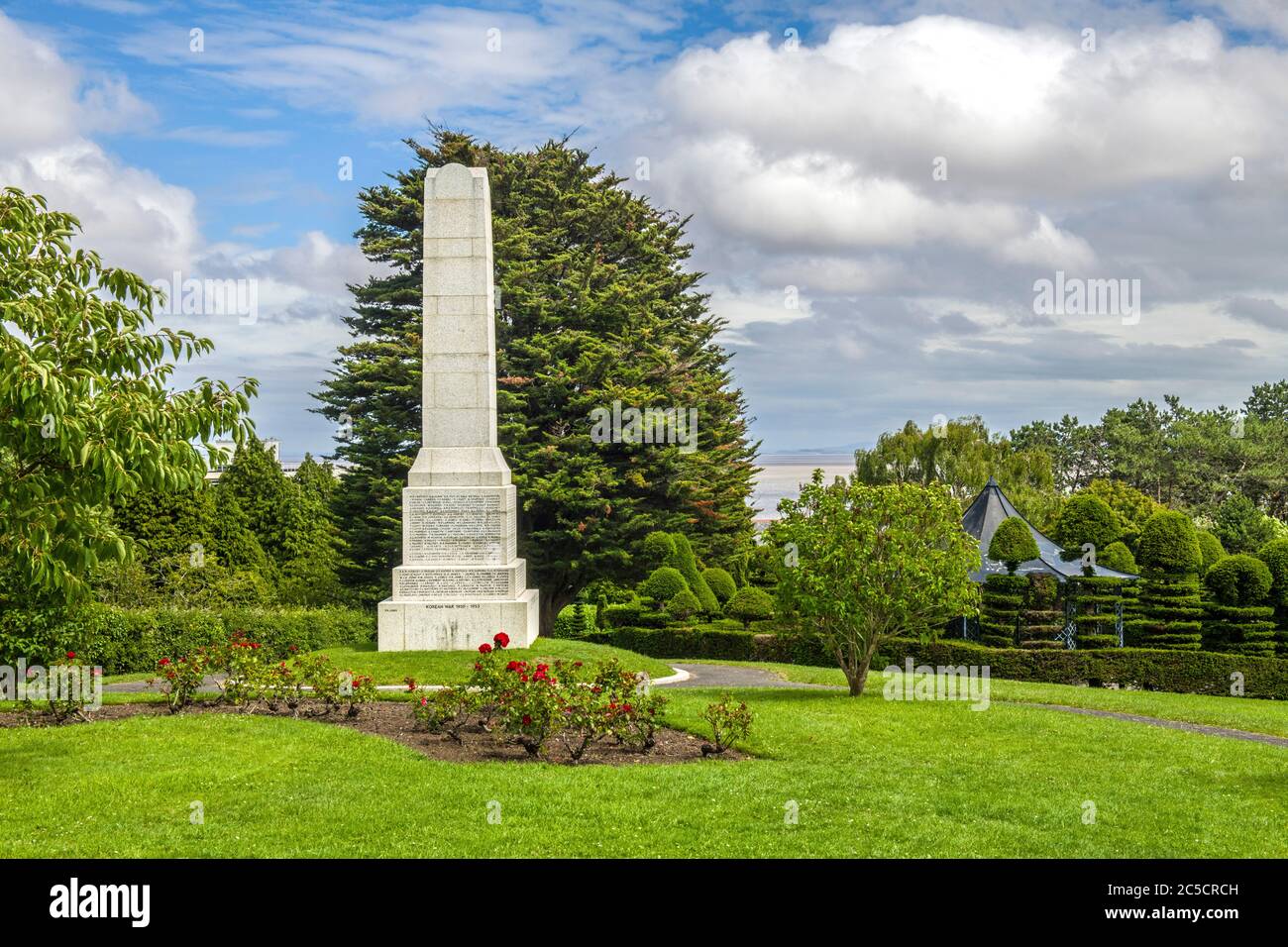 A war memorial in the Alexandra Park in Penarth, a seaside town in the Vale of Glamorgan south Wales in summer. Stock Photo