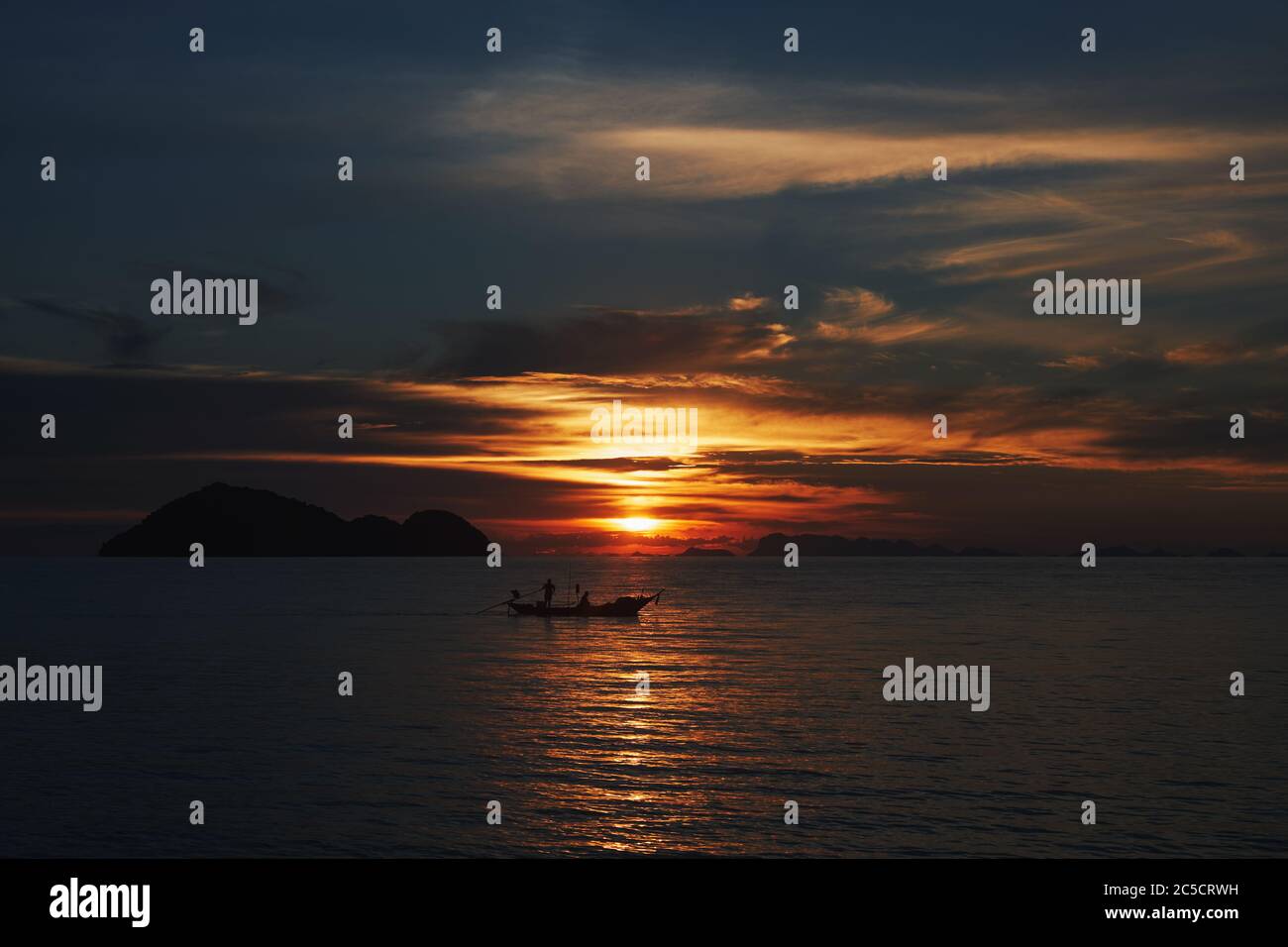 Koh Phangan island, Thailand. Sunset on the sea. Fisherman in a boat ...