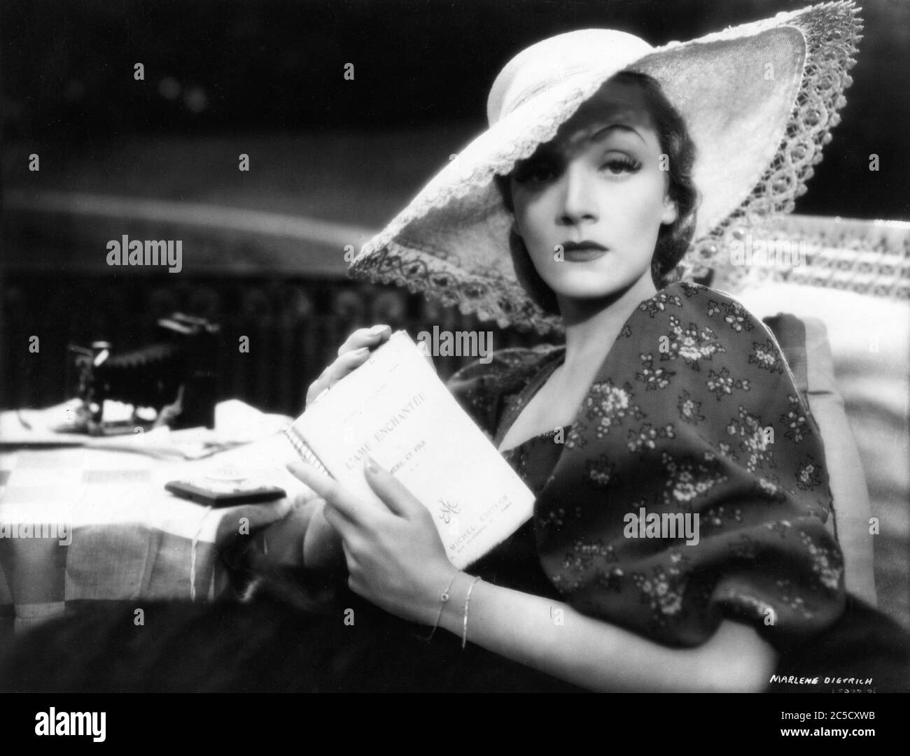 MARLENE DIETRICH on set candid portrait during filming of KNIGHT ...