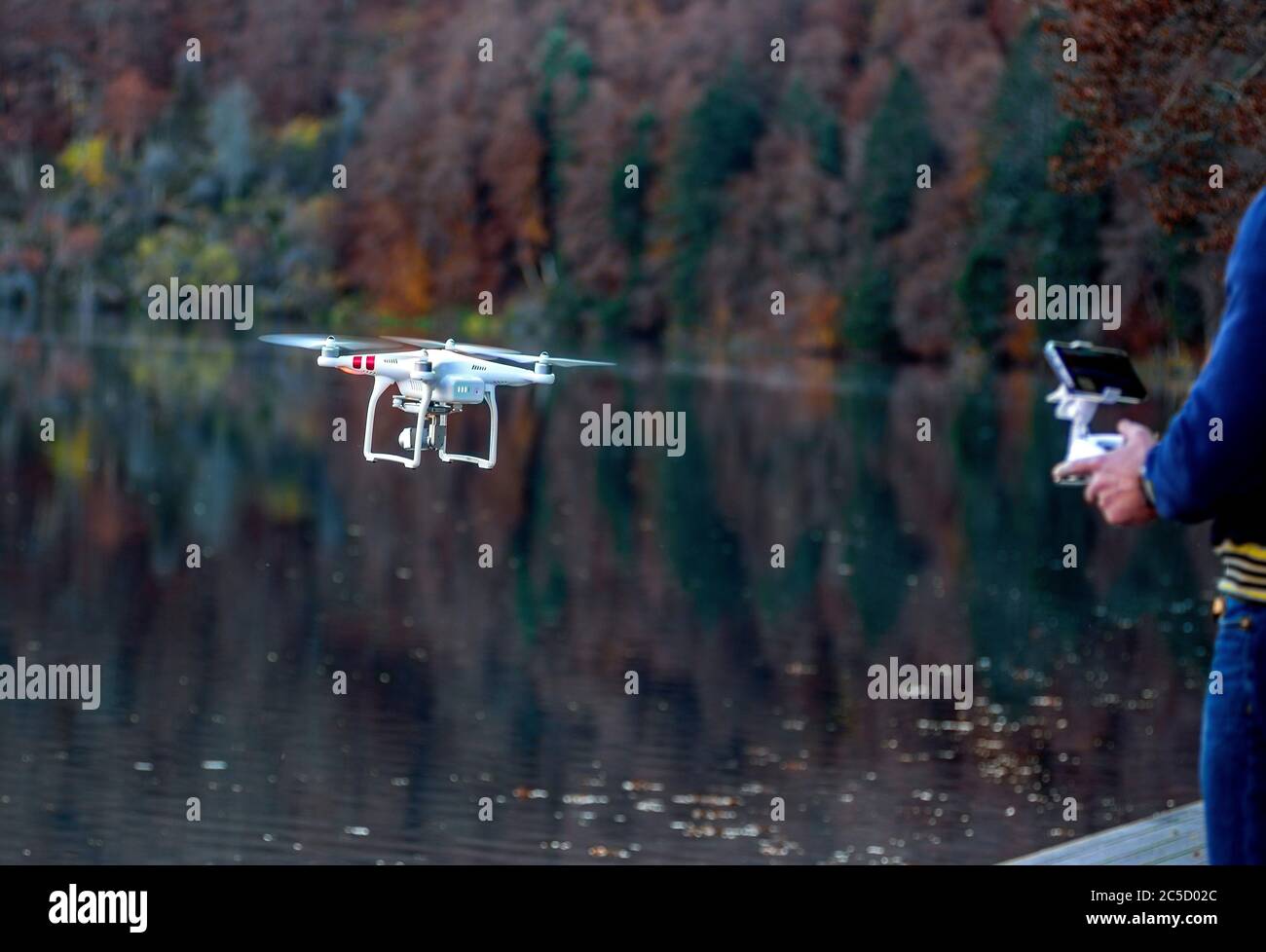 Drone with camera on a lake, Auvergne-Rhone-Alpes, France Stock Photo