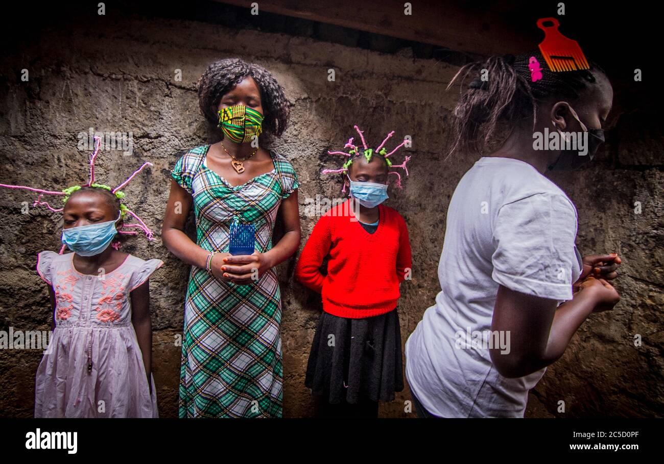 May 9, 2020, Nairobi, Kenya: Kids using their hair style braids to create awareness and sensation on Coronavirus (COVID-19)..Little girls from Kenya are using their hairstyles to spread awareness and sensation to May 9, 2020, Nairobi, Kenya: Kids using their hair style braids to create awareness and sensation on Coronavirus (COVID-19)..Little girls from Kenya are using their hairstyles to spread awareness and sensation to