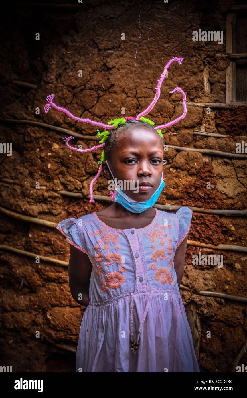 May 9, 2020, Nairobi, Kenya: Stacy Ayuma uses her hair style braids to  create awareness and sensation on Coronavirus (COVID-19)..Little girls from  Kenya are using their hairstyles to spread awareness and sensation