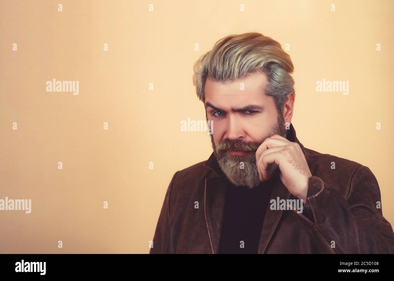 Muscular man in leather jacket hi-res stock photography and images - Alamy