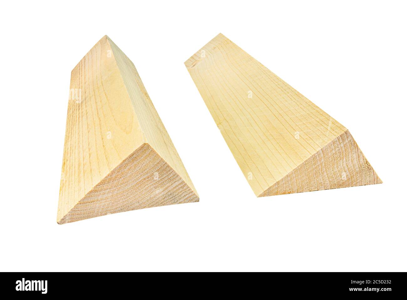 Two wooden wedges isolated on a white background with a clipping path. Stock Photo