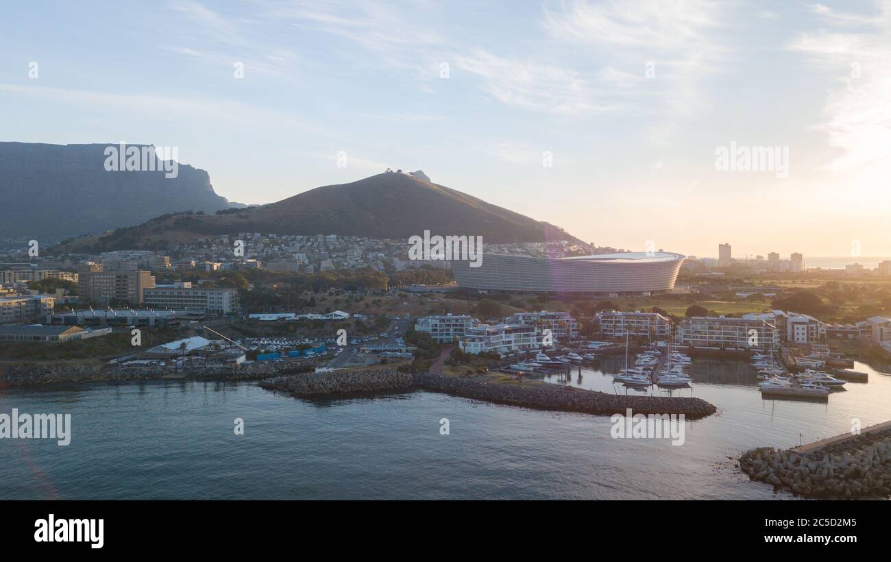 aerial views of the cape town stadium and the house around and port. views of table mountain behind Stock Photo