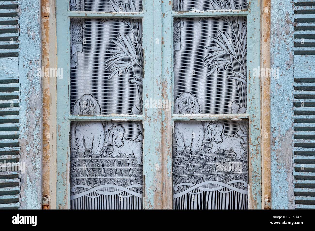 Old rural house window with wooden shutters (grungy, peeling paint) and ...