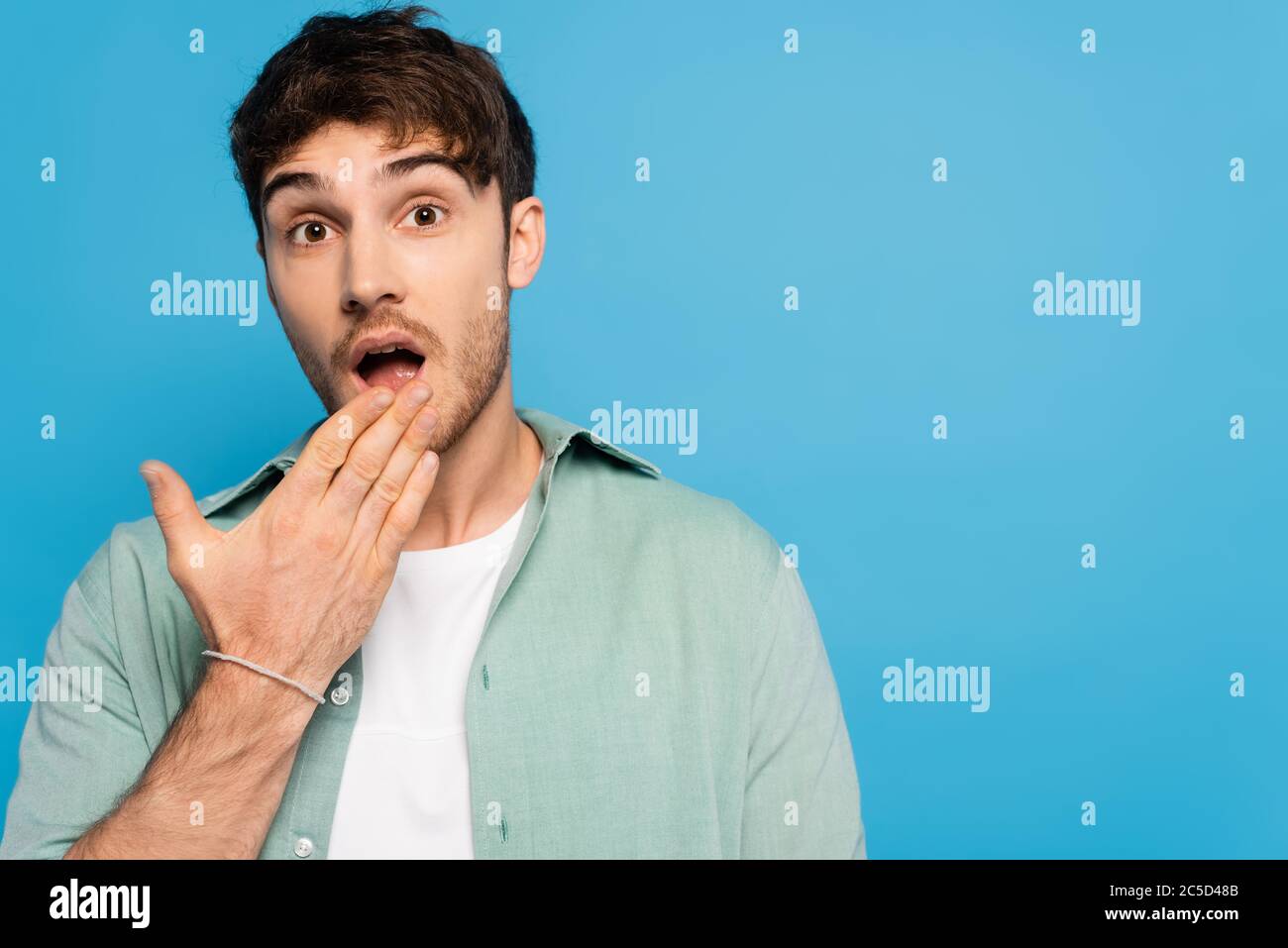 Shocked young man looking at camera hi-res stock photography and images ...