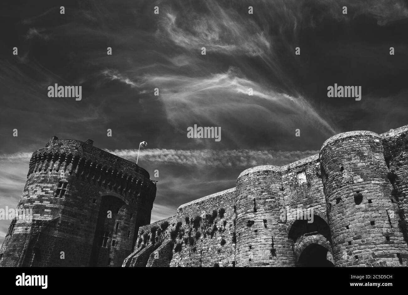 Dinan castle tower and walls. Brittany, France. Black and white photo. Stock Photo