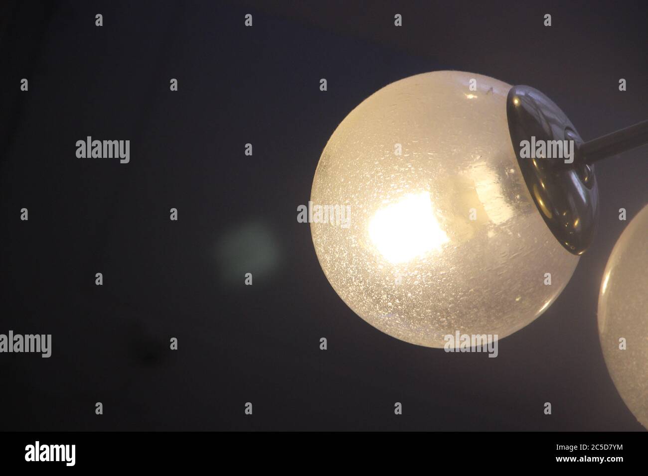 Light bulb on dark background, concept of creativity Stock Photo