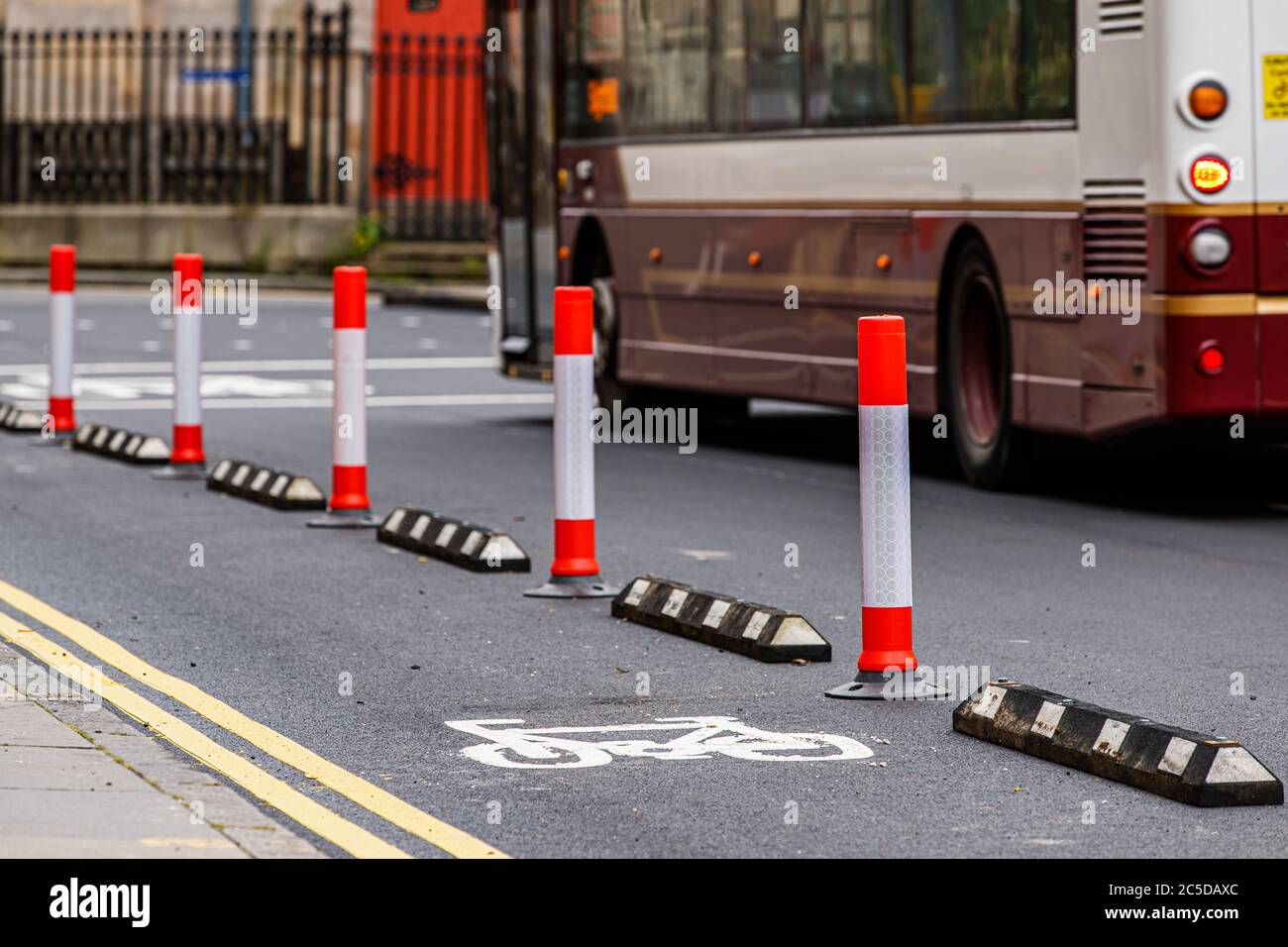 Edinburgh, Scotland, UK. 2 July, 2020. Edinburgh City Council have installed temporary segregated cycle lanes on a number of key City Centre routes, like here on George IV Bridge. Andrew Perry/Alamy Live News Stock Photo
