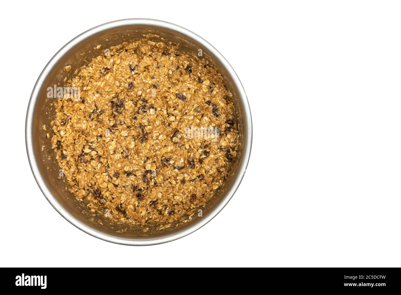 Oatmeal Raisin Cookie Dough In Mixing Bowl Stock Photo