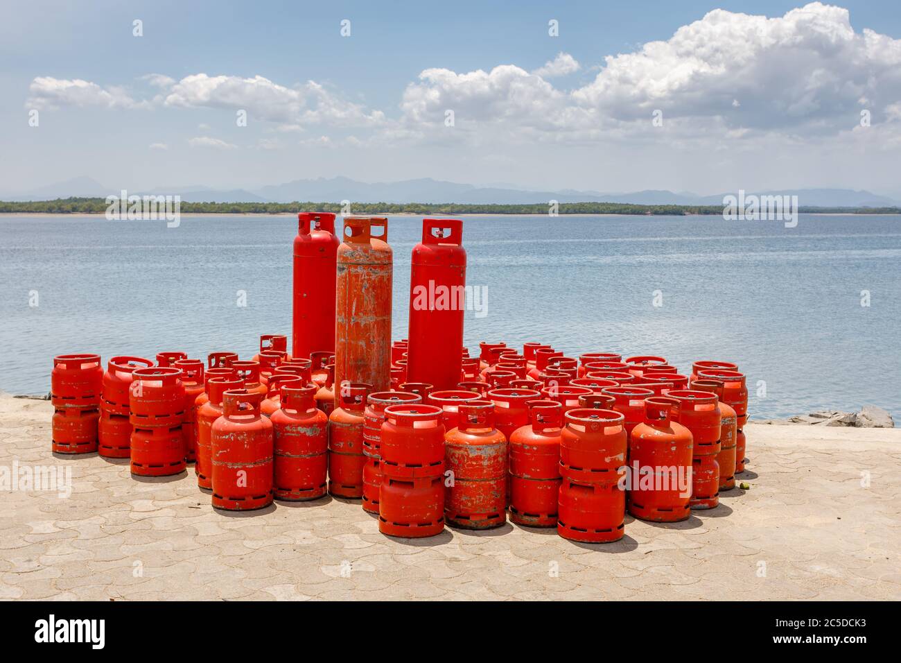 Domestic red Propane Gas Bottle on port in Nosy Be, Madagascar Stock Photo