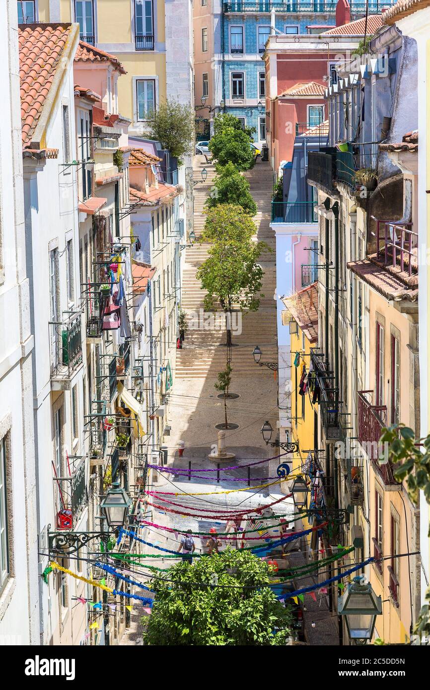 Old narrow street in lisbon hi-res stock photography and images - Alamy