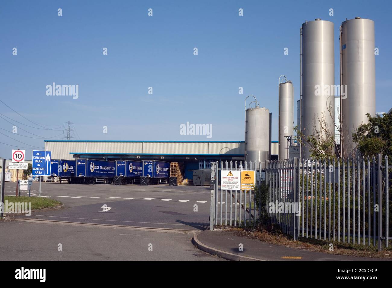 RPC Tedeco Gizeh, makers of plastic cups, factory at Kenfig industrial estate with Hicks transport lorries Stock Photo