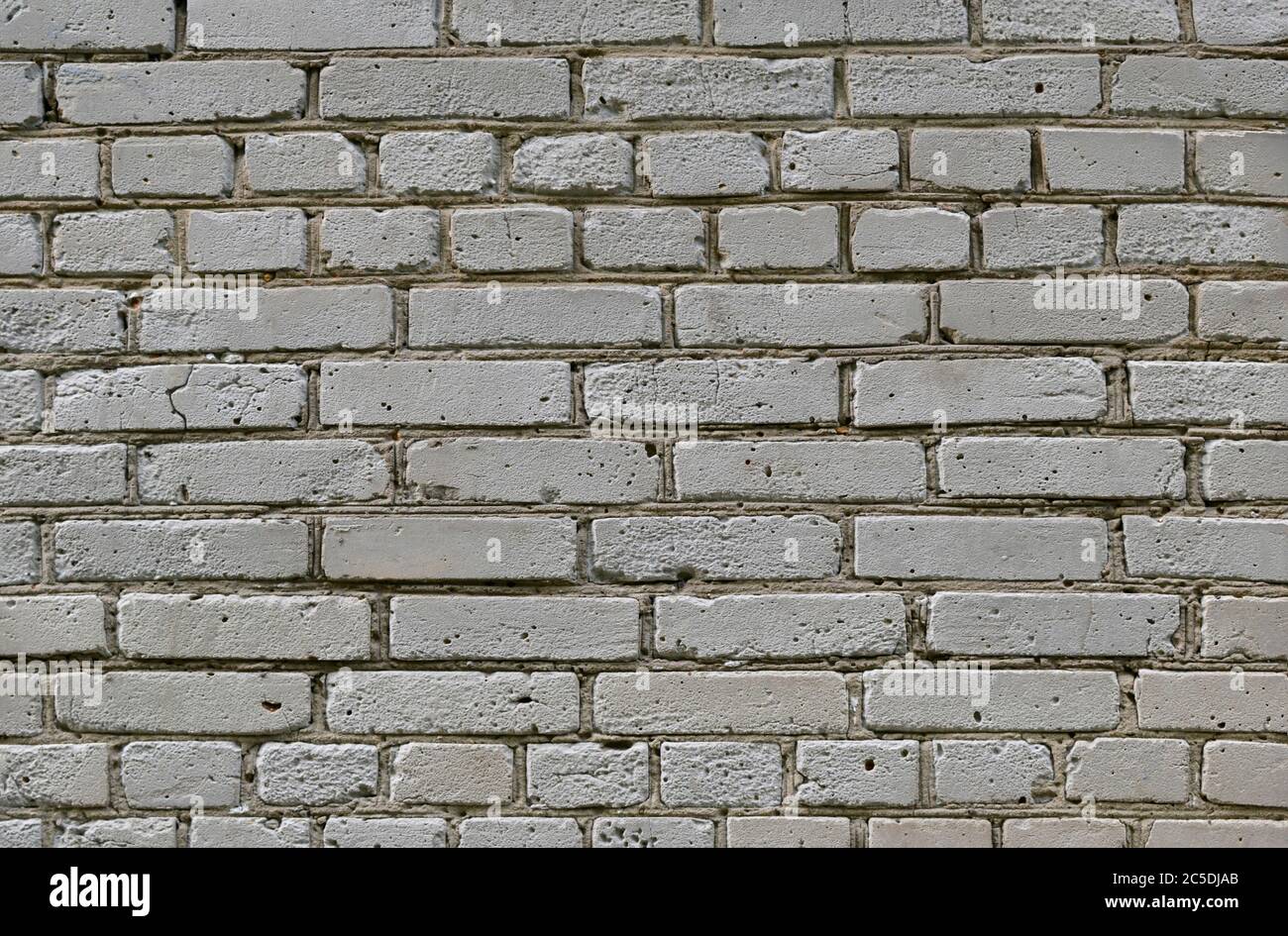 a gray brick wall texture background Stock Photo - Alamy