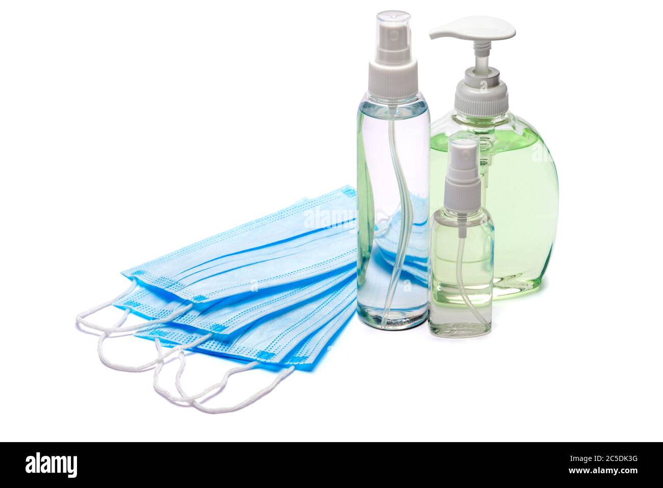 bottle of cream, lotion, sanitizer or liquid soap and protective mask ...
